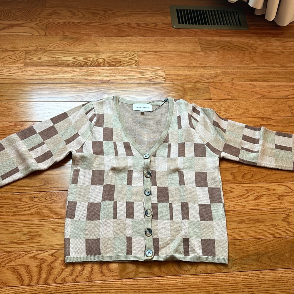 Small, brown sweater